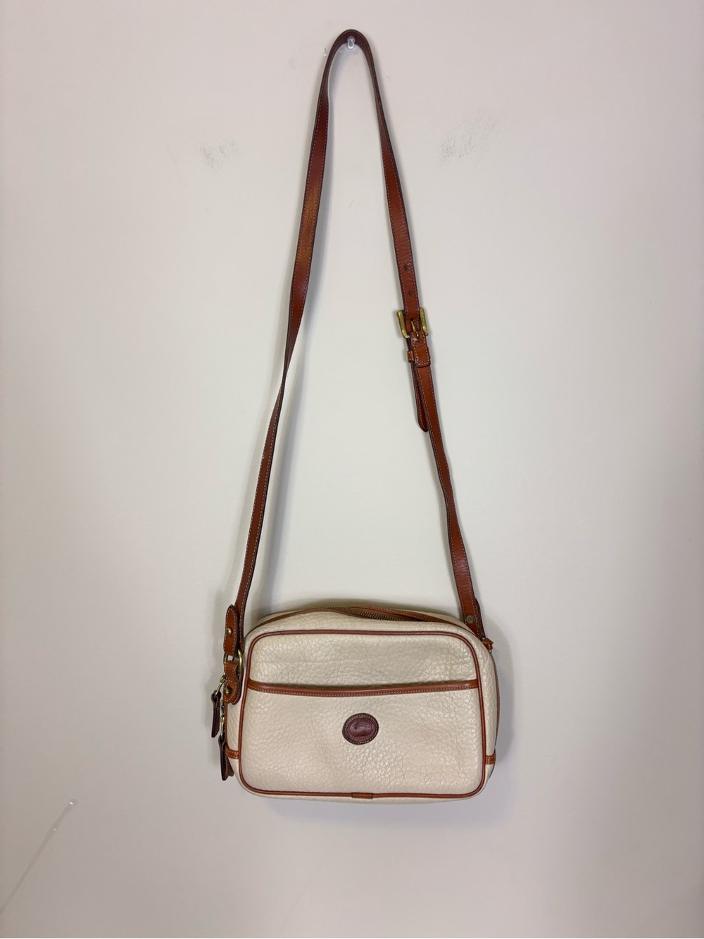 Dooney & Bourke Cream Pebbled Leather Crossbody with Brown Trim